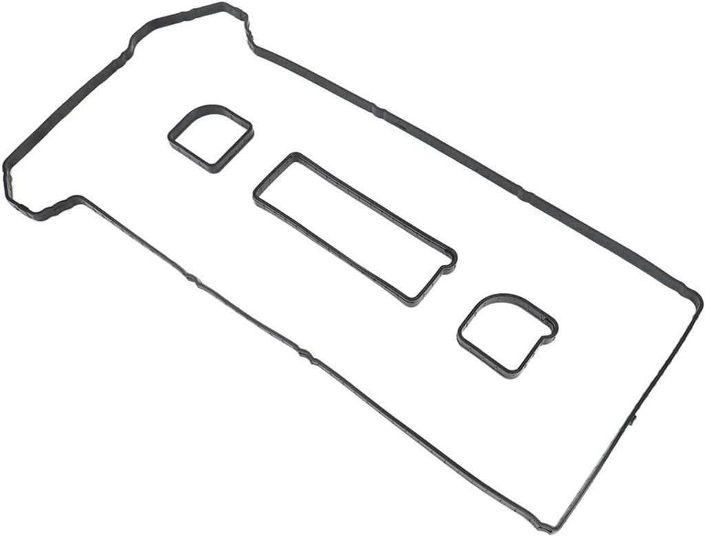 Valve cover gasket set with long gasket and three smaller molded seal shapes.