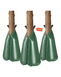 Set of three green PVC tree watering bags with wide opening and black handle tabs
