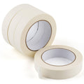 Beige masking tape rolls, one stacked with a loose roll in front