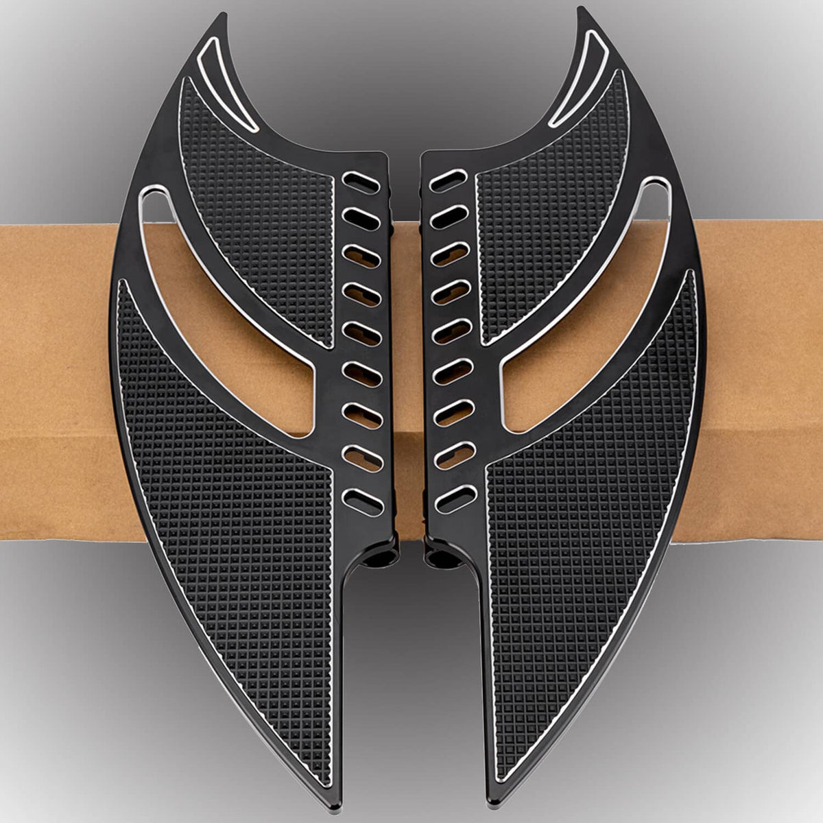 Front motorcycle floorboards pair, black textured pads with silver trim and mounting slots