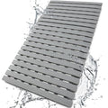 Grey ribbed shower mat with raised bars and water-splash texture for grip