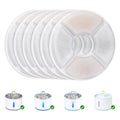 Stack of round gray replacement water filter discs with center cutout holes