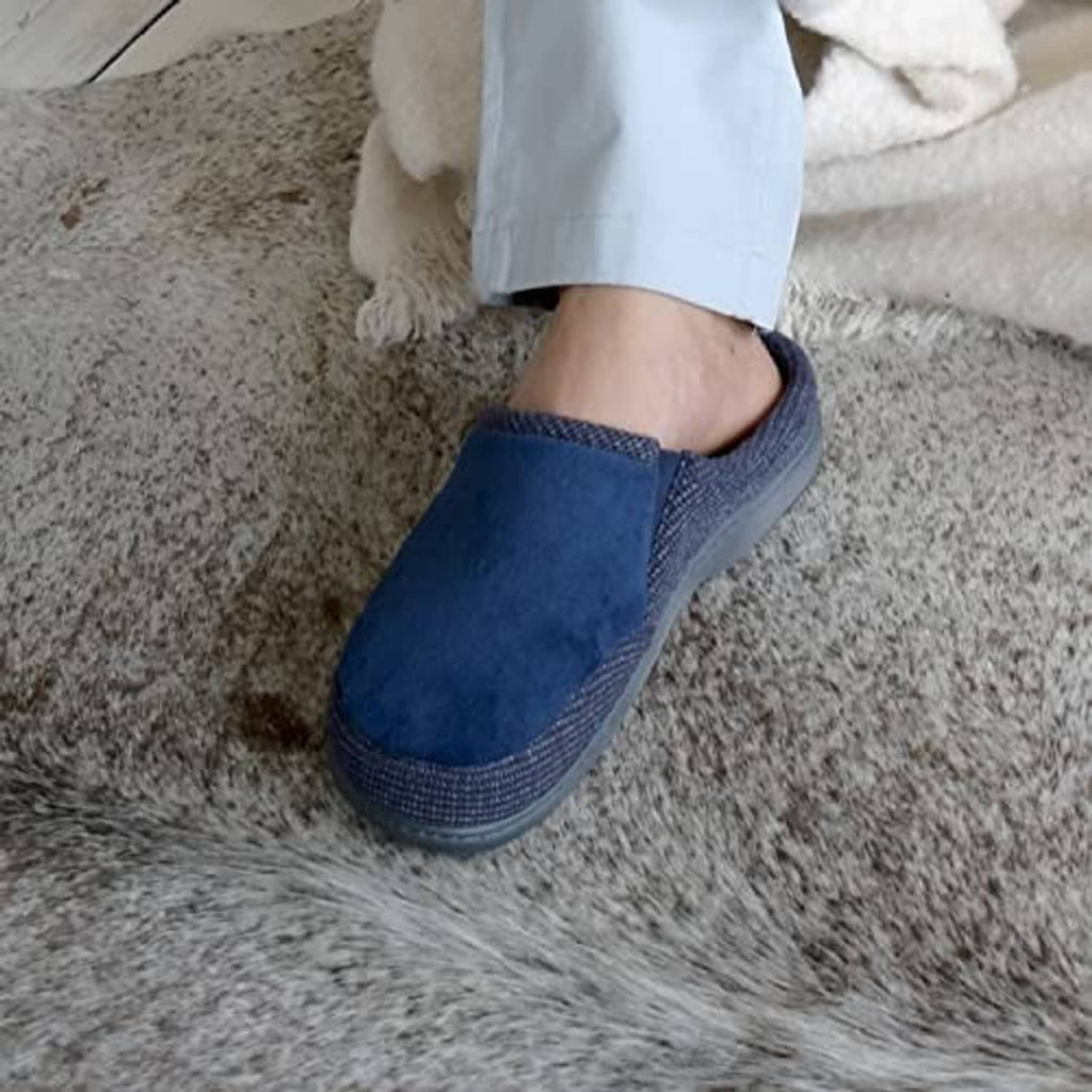 Men's navy slip-on slipper worn with pant cuff