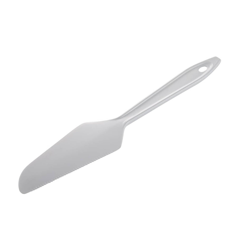 White plastic spreader/knife with wide blade and oval hole on handle
