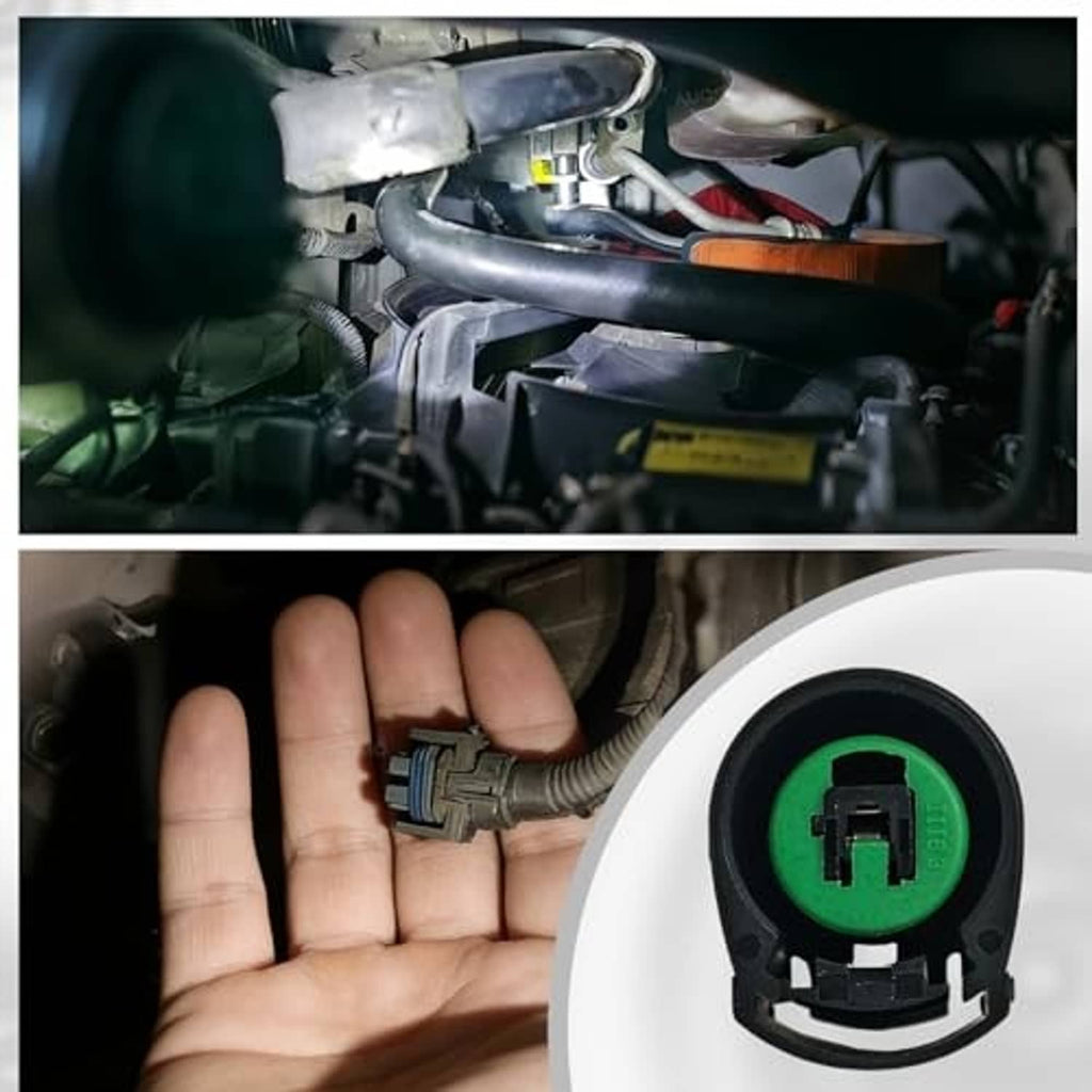 AC compressor connector pigtail plug held in hand, showing green contact insert and wiring