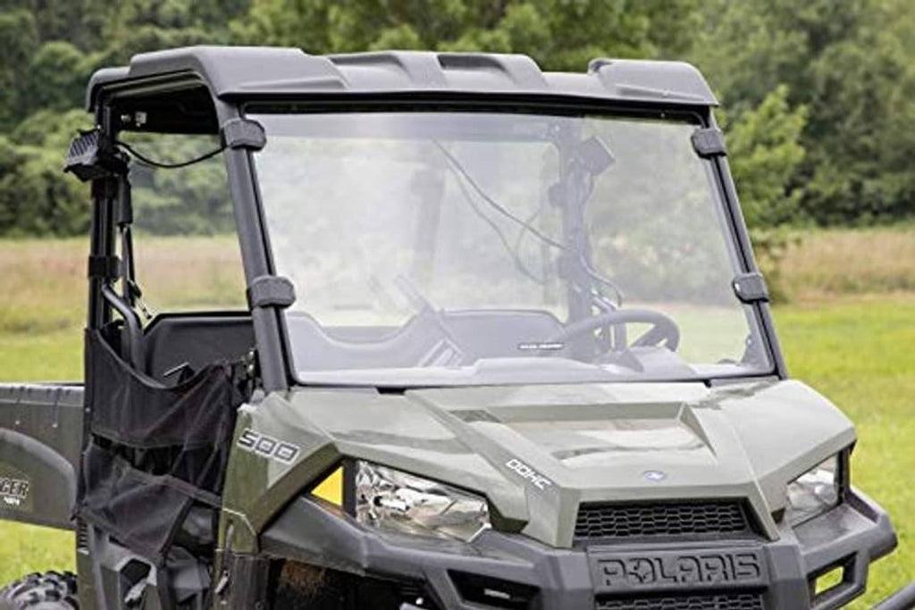 Front full windshield with black frame mounted on a Polaris side-by-side