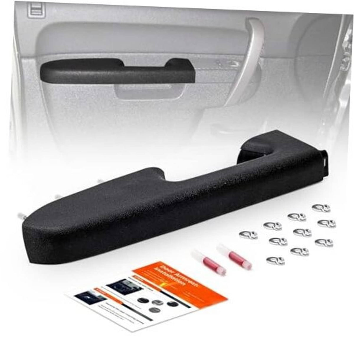 Black door panel armrest repair piece with small hardware and instruction cards.