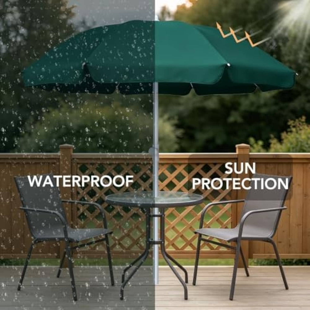 Green outdoor umbrella canopy with raindrops and scalloped edge, center pole