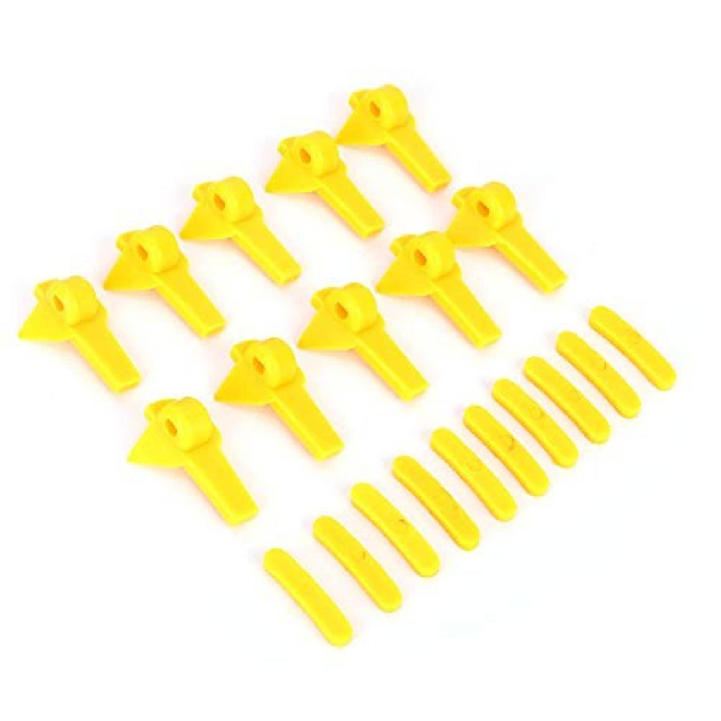 Yellow tire changer duck head inserts arranged in two groups, curved tabs with pointed ends