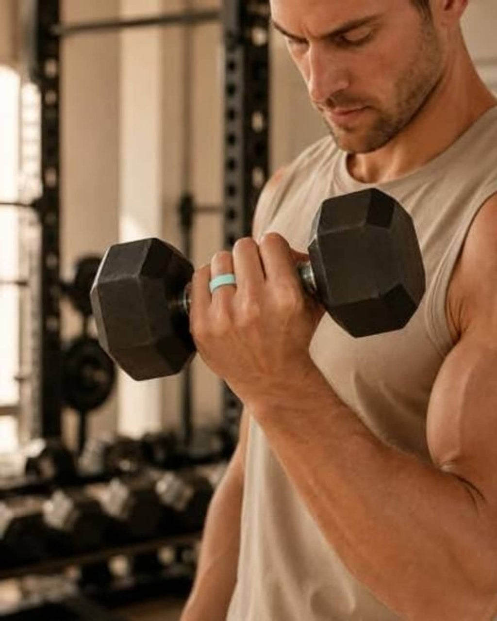 Black silicone ring cover on finger during workout, secure snug fit