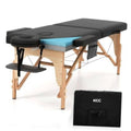 Portable foldable massage table with black padded cover, blue memory foam, wooden legs